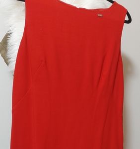 Escada sleeveless midi length dress tapered to fit.